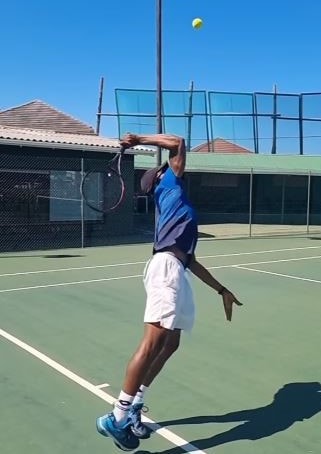 Coach Kazeem serves it up!